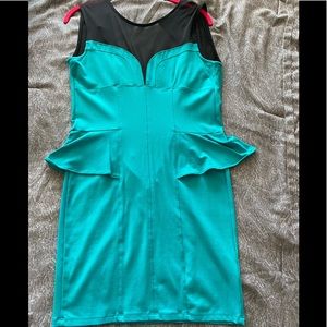 Peplum style dress with zipper up the back